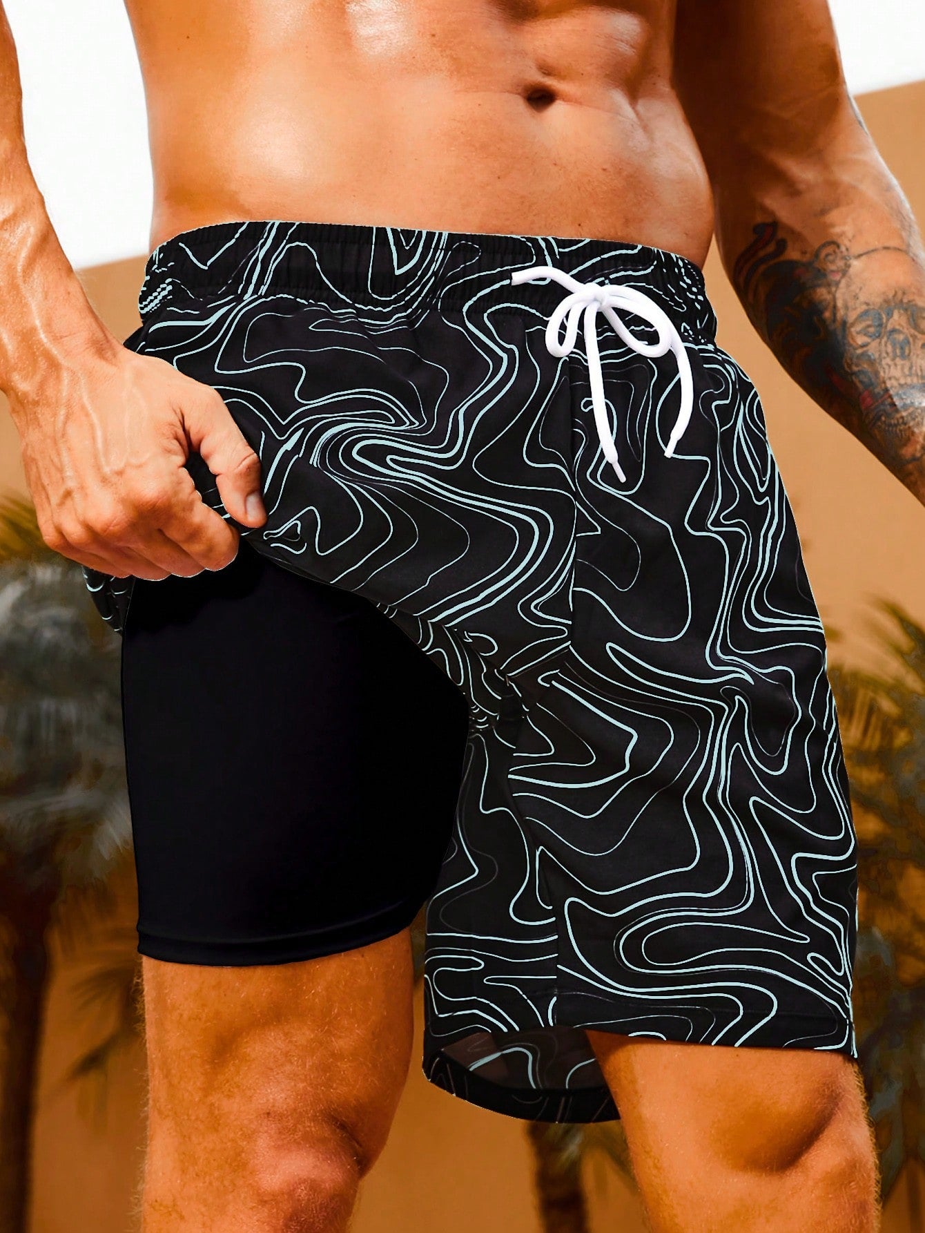 Manfinity Men's Black Allover Print Swim Trunks with Drawstring