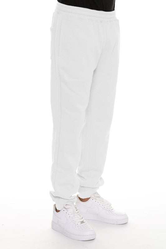 Premium cotton sweat pant with elastic waist and ankle, featuring standard and single back pocket.