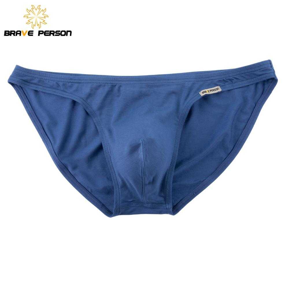 Men's blue modal low-rise briefs with elastic waistband.