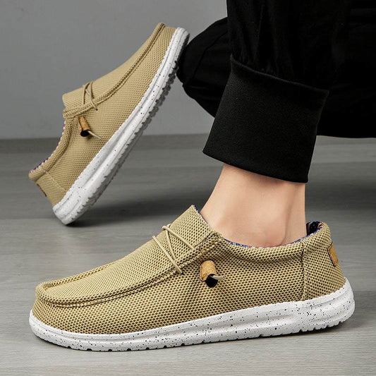 Men's casual mesh loafers with breathable design and lace-up closure.