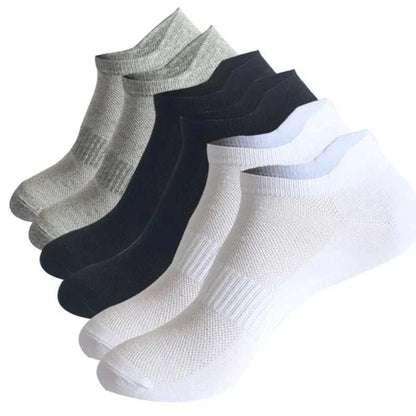 6 pairs of solid color ankle boat socks for men and women, featuring a mesh design for breathability, ideal for sports and running.