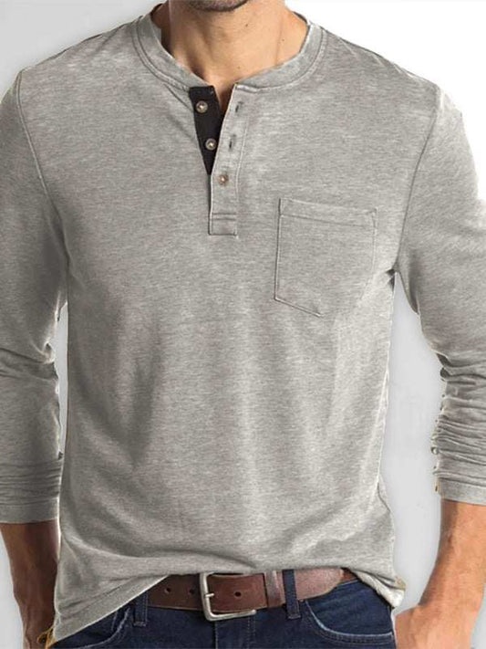 Men's long-sleeved solid color t-shirt with round neck and welt pocket.