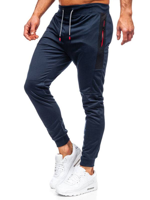 Men's sweatpants with contrasting color pocket, straight casual design, mid-waist, polyester blend.