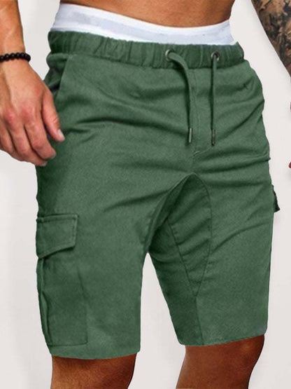 Men's woven casual cargo shorts with multi-pockets, low waist, green color.