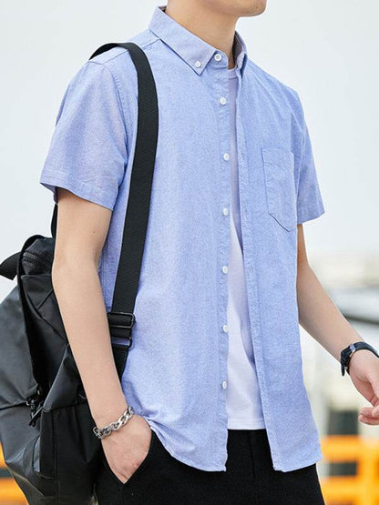 Youthful Casual Oxford Short-Sleeve Shirt with Stylish Double Pockets for Effortless Outings