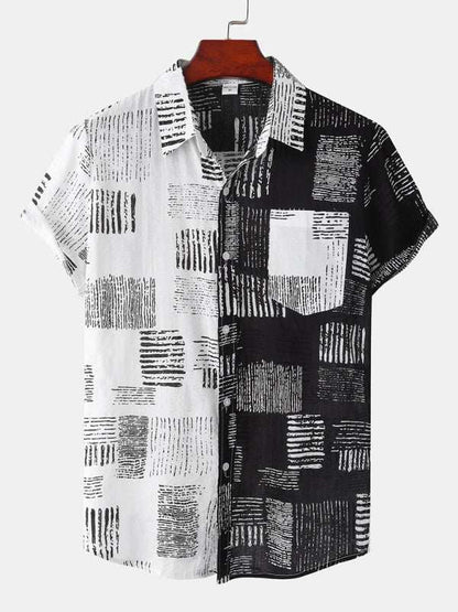 Hawaiian style black and white digital print short sleeve men's shirt on hanger.