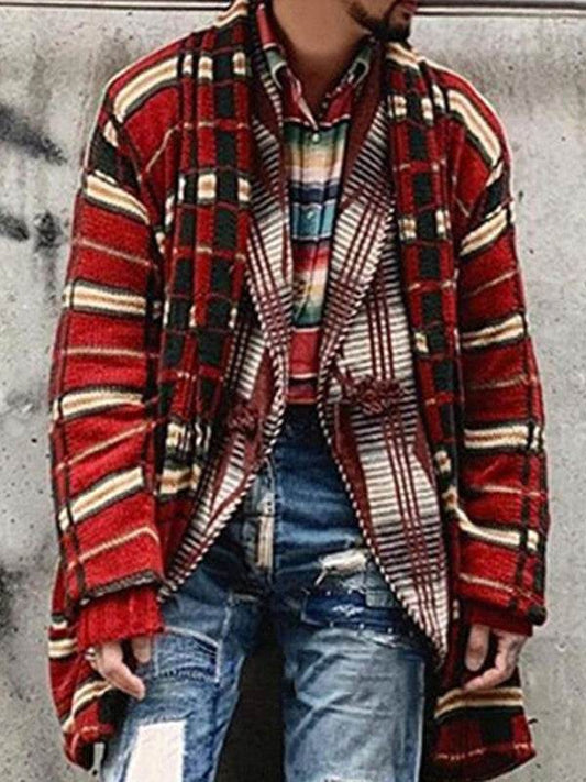 Men's fashion plaid knitted cardigan in red and black stripes, worn over a plaid shirt and paired with distressed jeans.