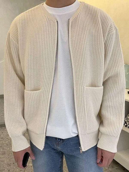 Men's solid color loose casual knitted sweater cardigan in cream with welt pockets, autumn-winter fashion.