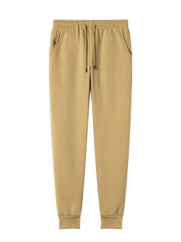 Men's casual loose pocket sports trousers in beige color made of 100% polyester with slight elasticity, suitable for all seasons.