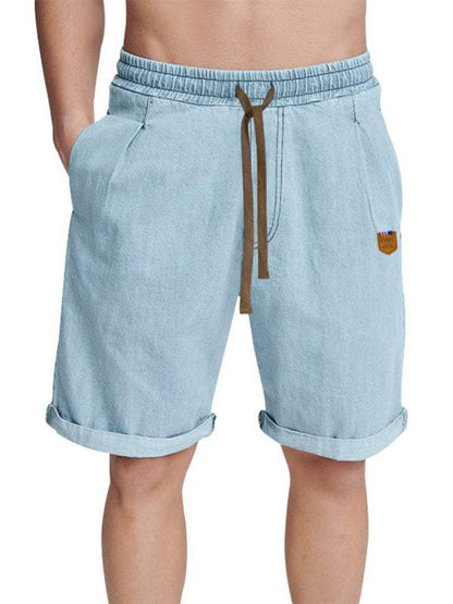 Casual high-waisted light blue three-quarter shorts with drawstring and pockets