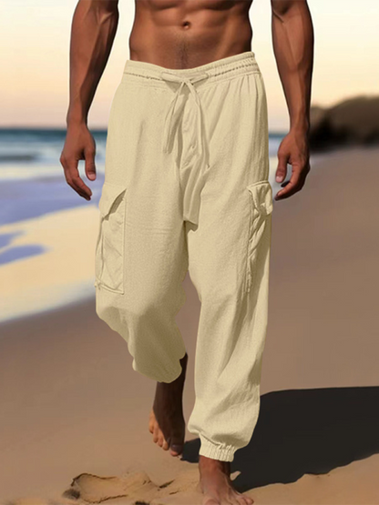 Casual cuffed multi-pocket drawstring trousers for spring-summer in 100% cotton.