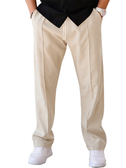 Men's loose straight sports casual trousers in beige, featuring slight elasticity and welt pockets, suitable for all seasons.