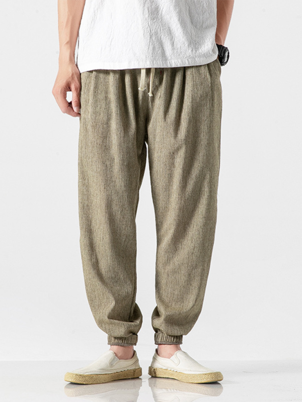 Men's linen trousers with drawstring, casual Haren style, beige color.